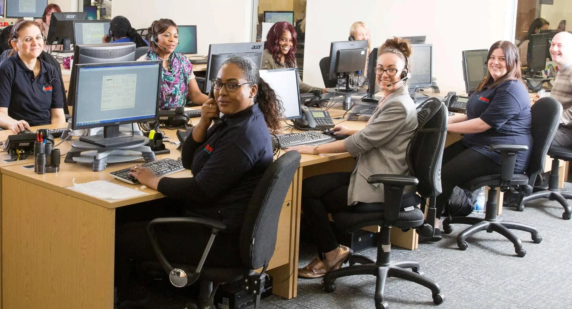 BSW customer service team members at their desks